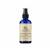 Blue spray bottle with a beige label on a white background